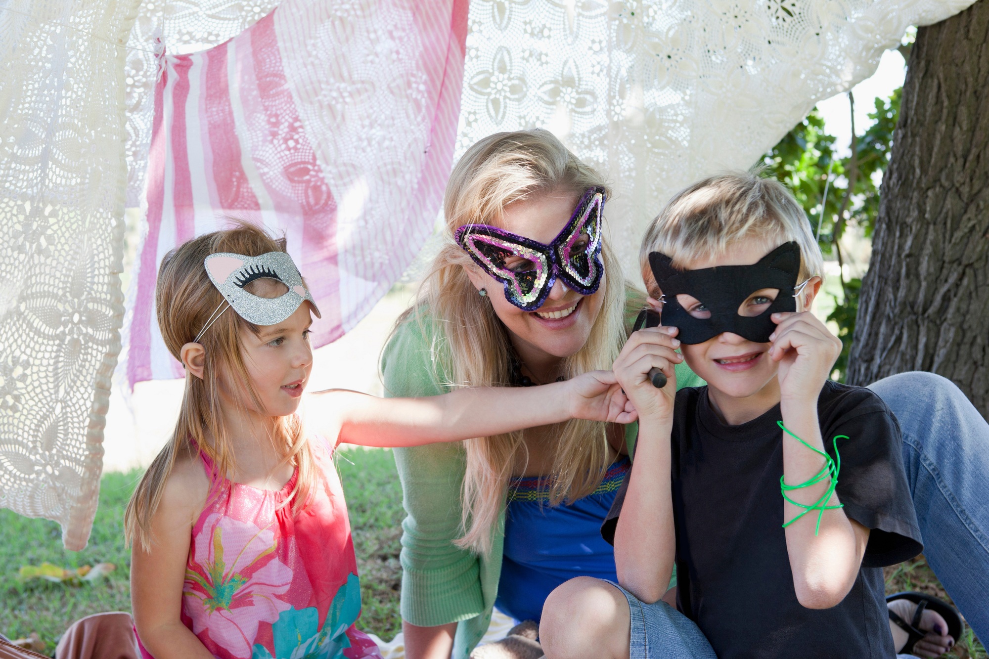 Mother and children wearing masks