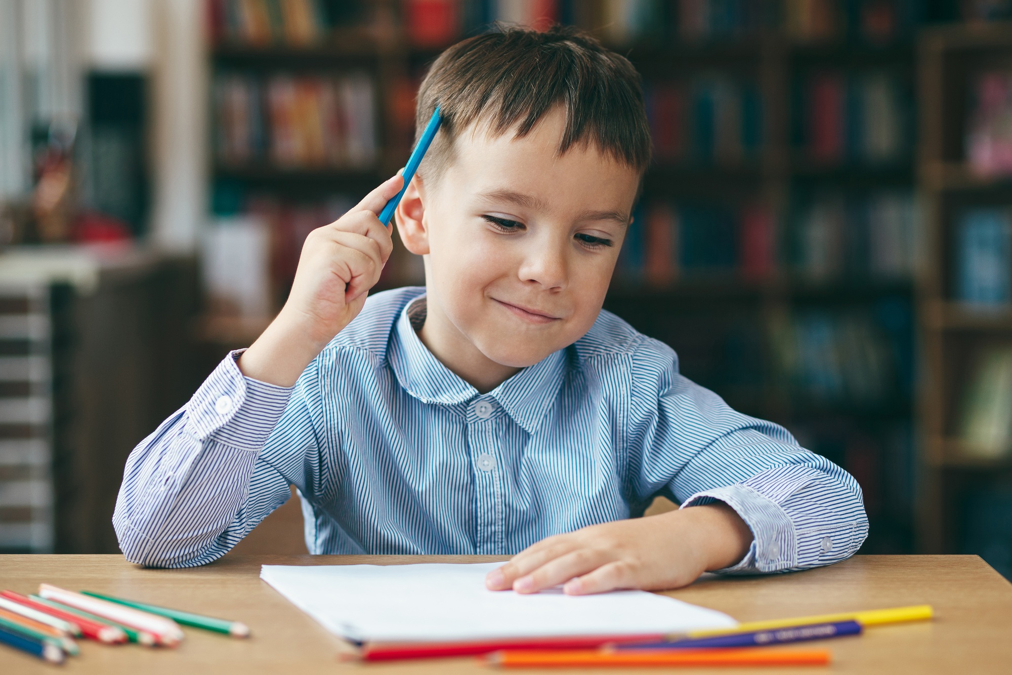 Preschool boy drawing