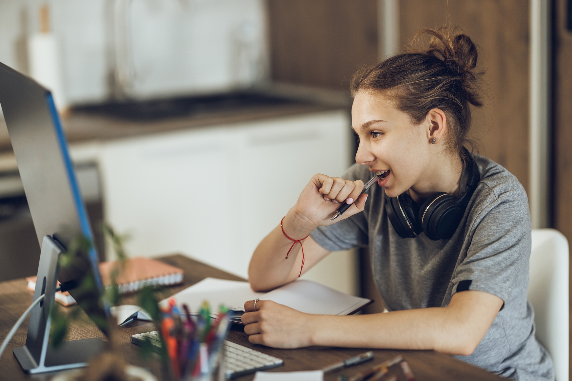 Teen Girl Doing Homework The Modern Way